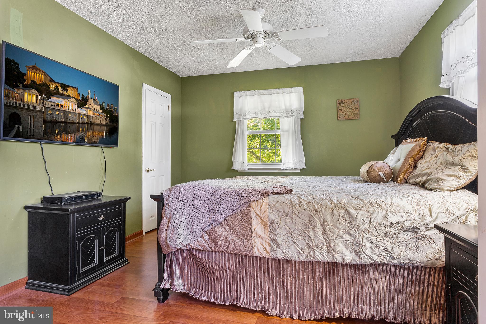409 Franklin Road Glassboro, NJ 08028 - Photo 15 of 30 a bedroom with a bed and a window