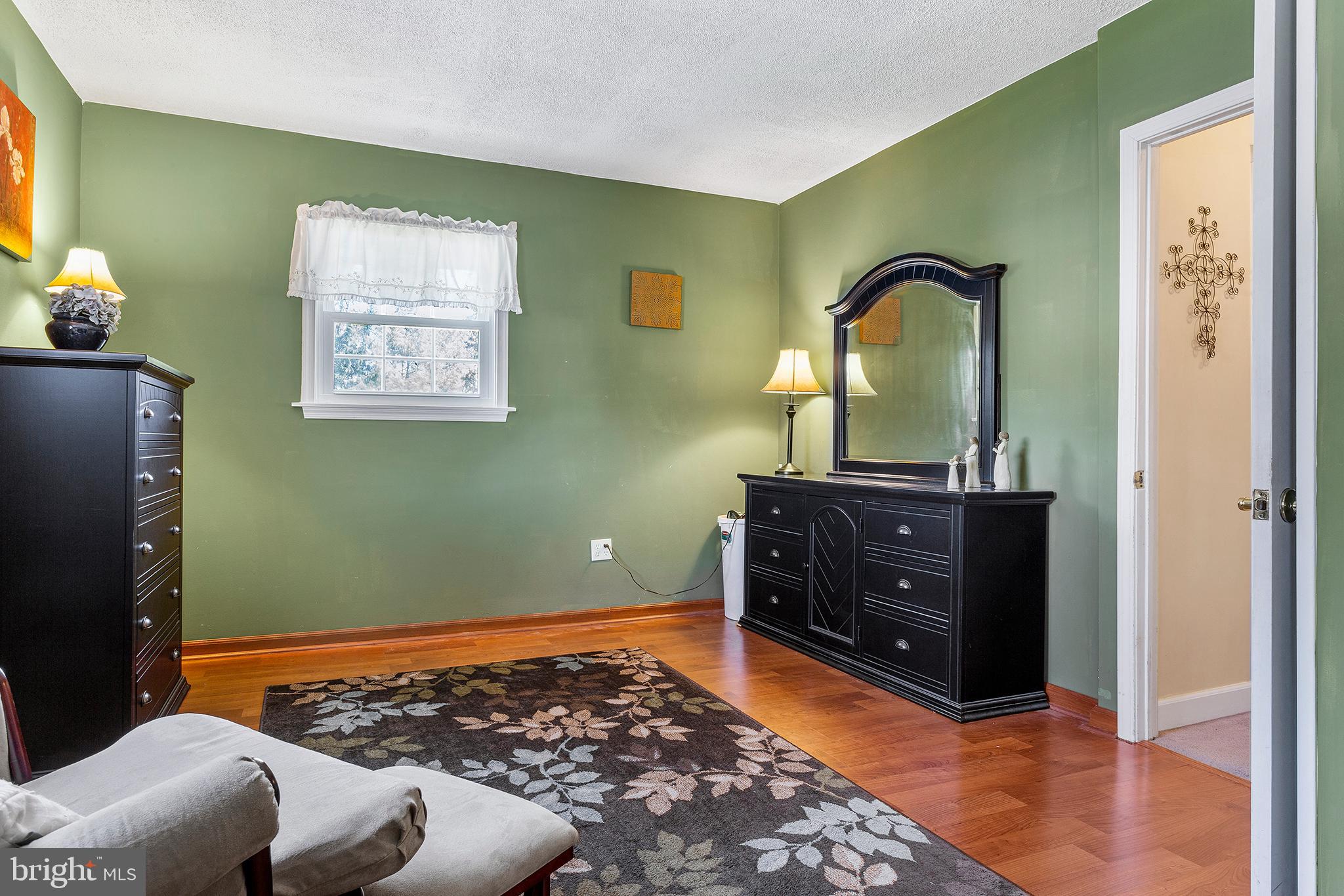 409 Franklin Road Glassboro, NJ 08028 - Photo 17 of 30 a room with furniture and a window