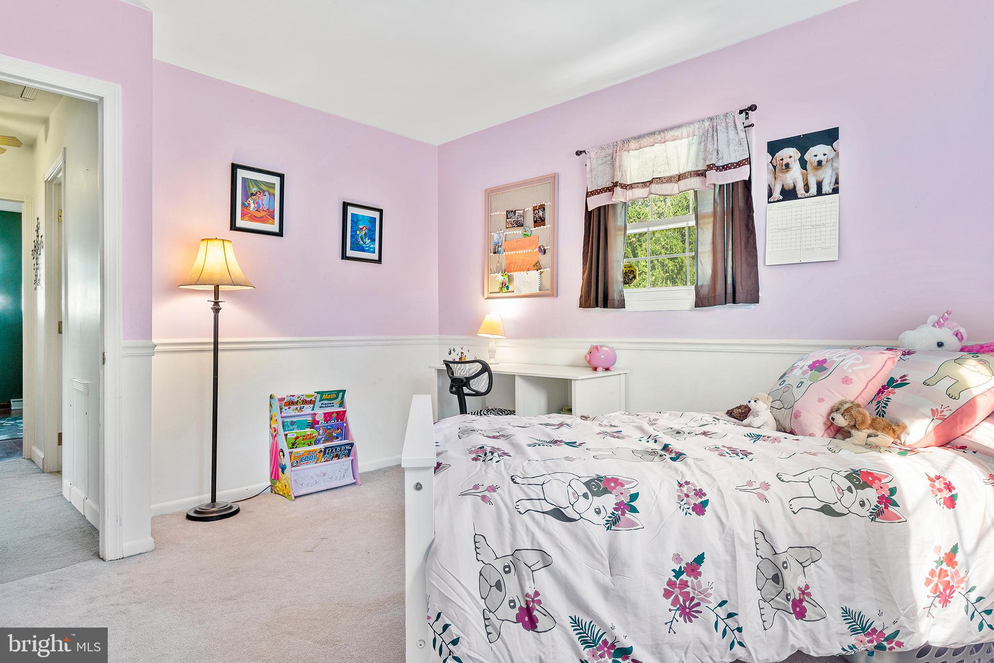 409 Franklin Road Glassboro, NJ 08028 - Photo 22 of 30 a bedroom with a bed and a window