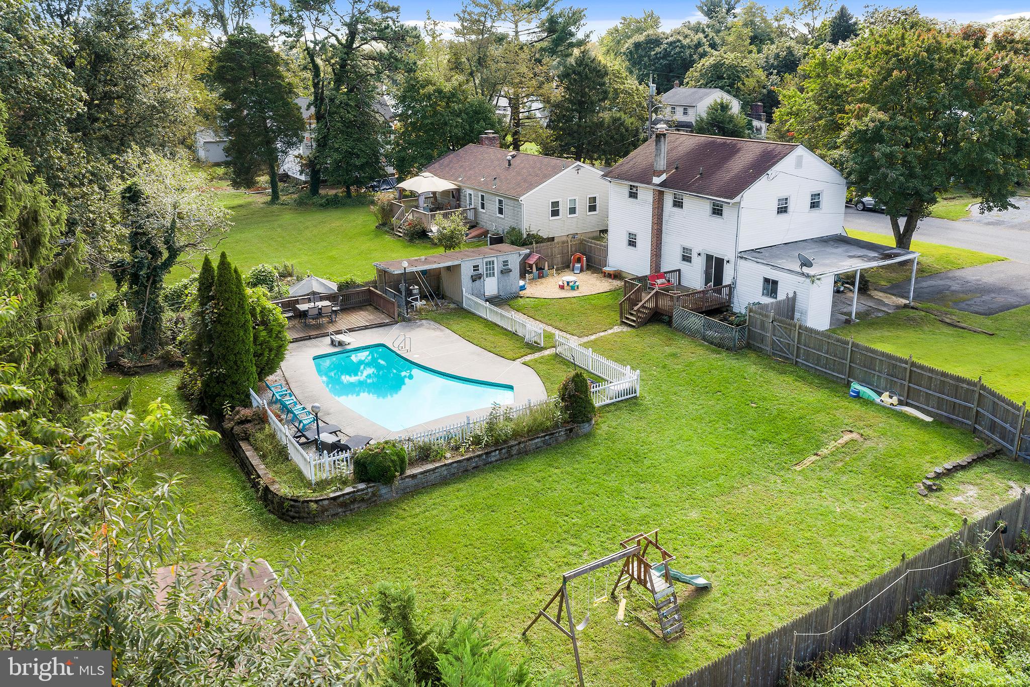 409 Franklin Road Glassboro, NJ 08028 - Photo 28 of 30 a view of a house with swimming pool and yard