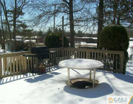 7 Lehigh Road Old Bridge, NJ 08859 - Photo 8 of 8 a view of a chairs and table in the patio