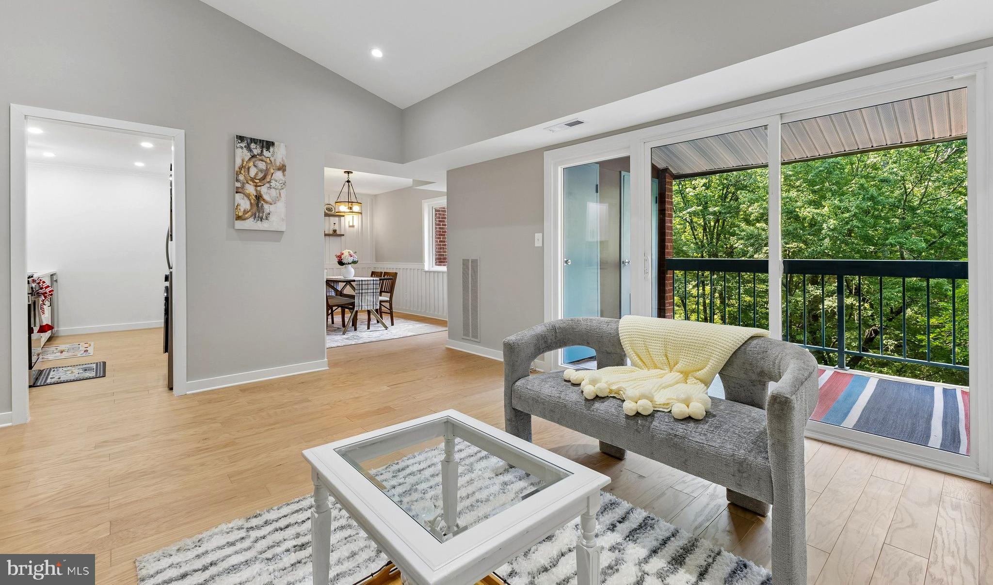 11841 Shire Court, Unit 31D Reston, VA 20191 - Photo 6 of 24 a living room with furniture and a large window