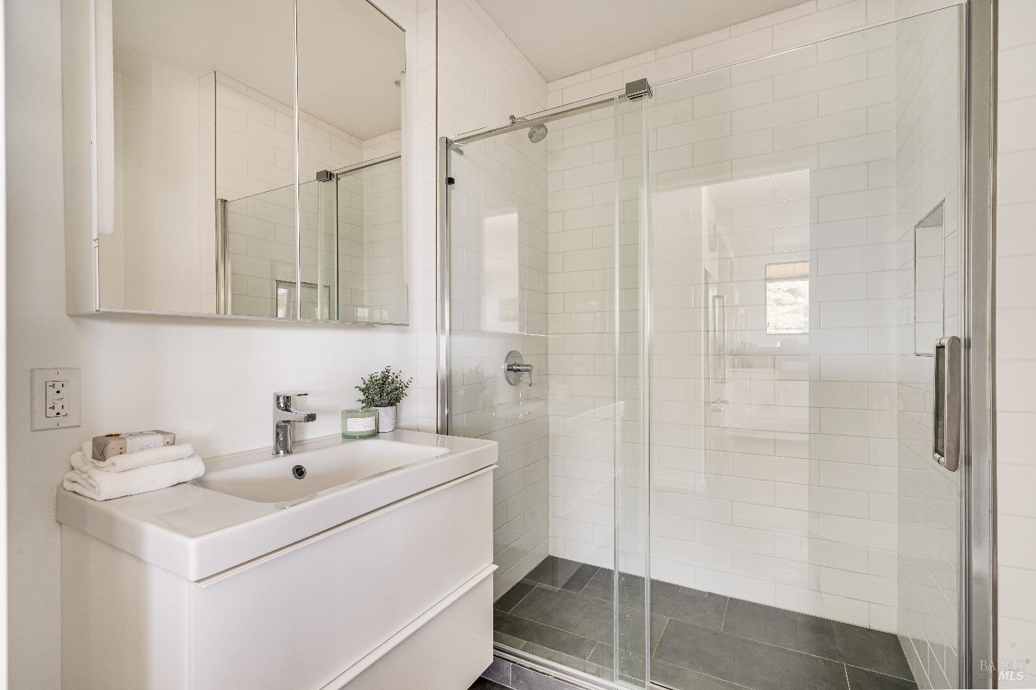 7871 Butts Canyon Road Pope Valley, CA 94567 - Photo 19 of 31 a bathroom with a sink a toilet and shower