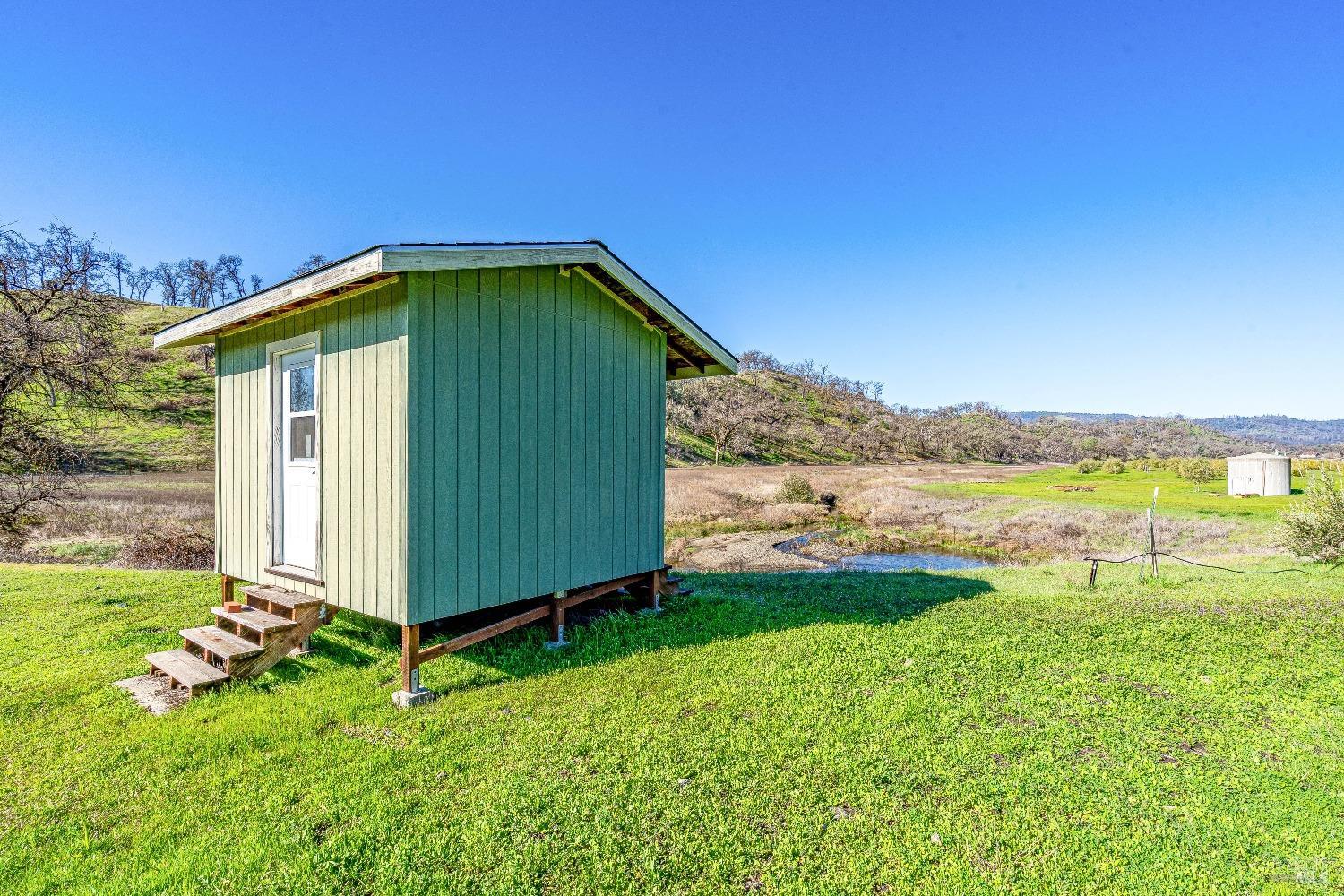 7871 Butts Canyon Road Pope Valley, CA 94567 - Photo 23 of 31 a view of a backyard with a garden and plants