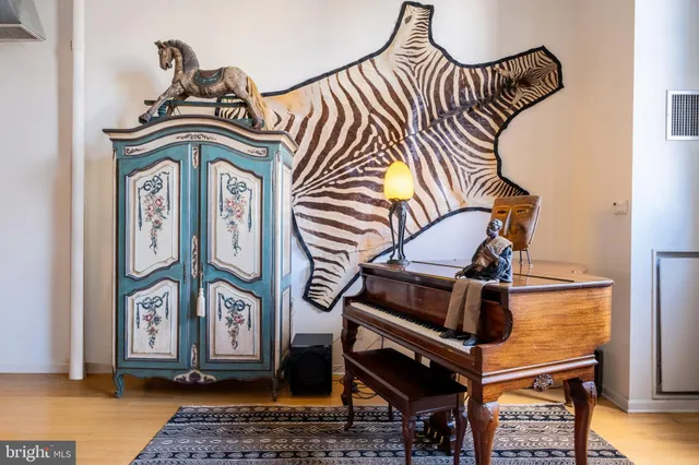 a view of front door with wooden floor