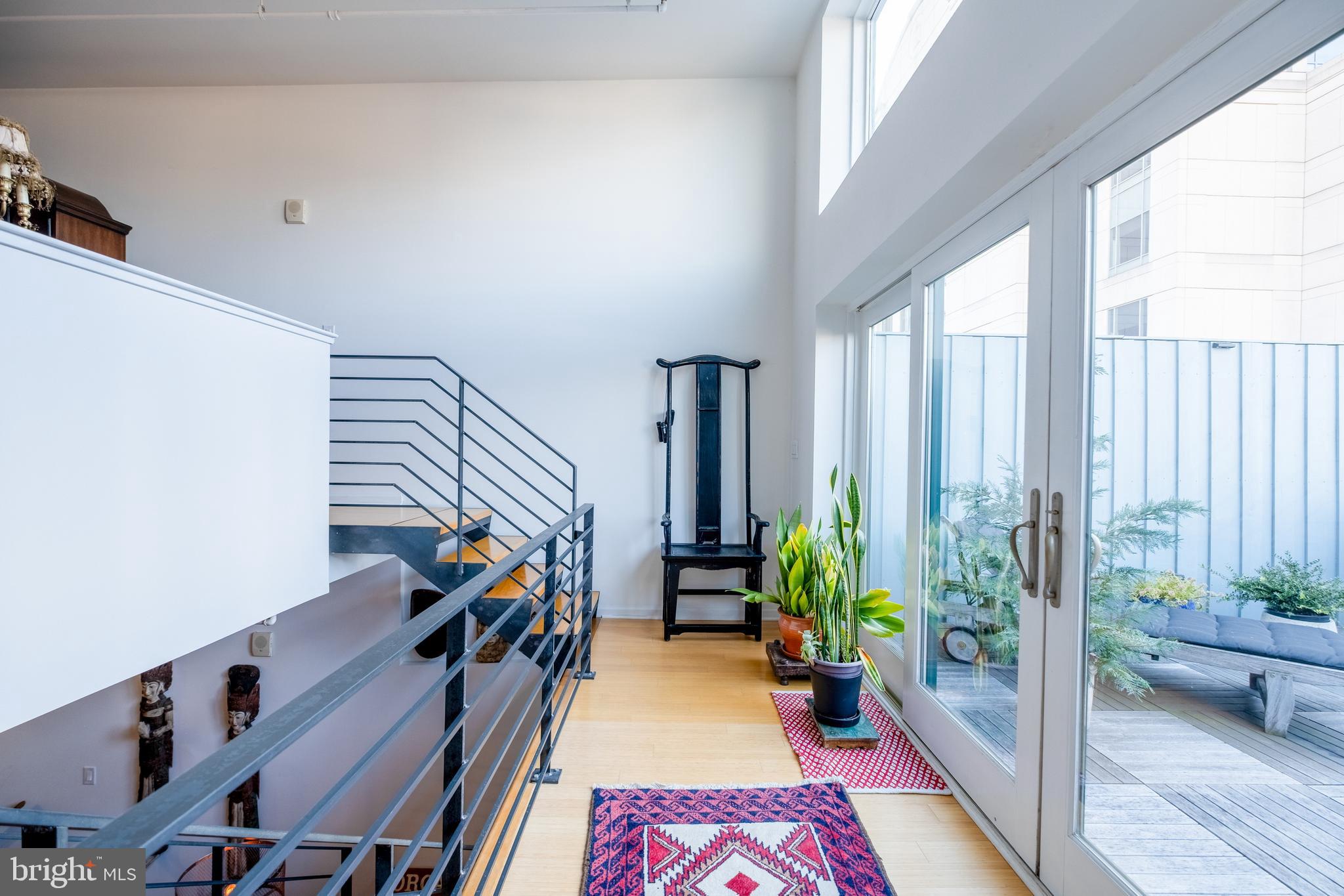 1228 Arch Street, Unit 8D Philadelphia, PA 19107 - Photo 17 of 26 a view of an entryway with wooden floor