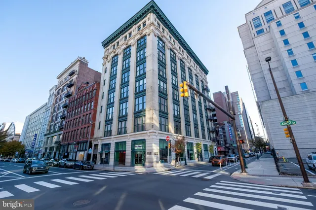 a view of a building with a street