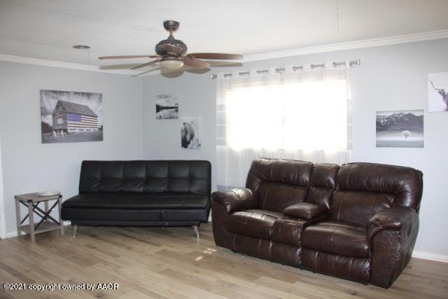 4801 South Rusk Street Amarillo, TX 79110 - Photo 3 of 20 a living room with furniture and a window
