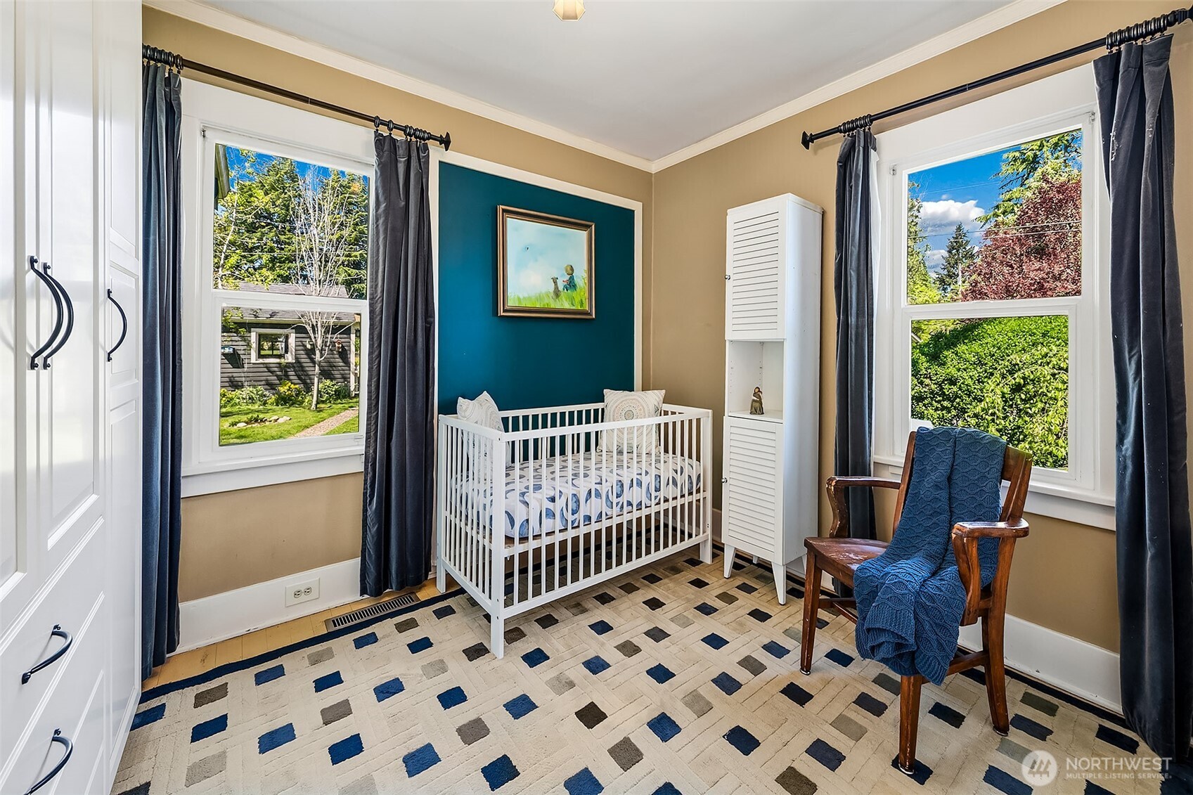 8403 32nd Avenue Southwest Seattle, WA 98126 - Photo 5 of 15 a bedroom with furniture and a window