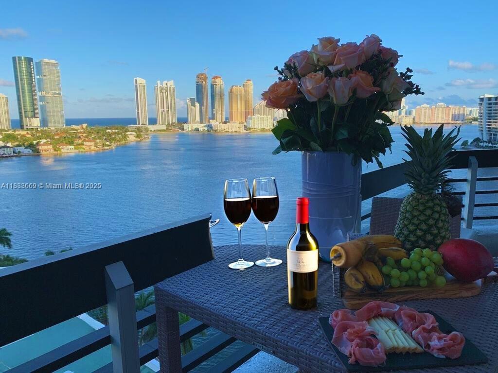 a room with a table potted plants on wooden floor and potted plants