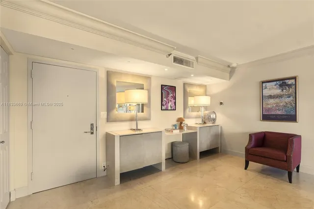 a view of an entryway with a rug