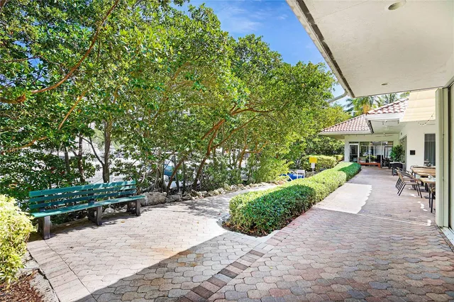 a front view of building with yard