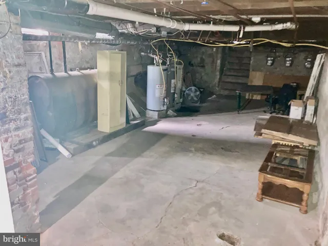 a view of a garage with wooden floor