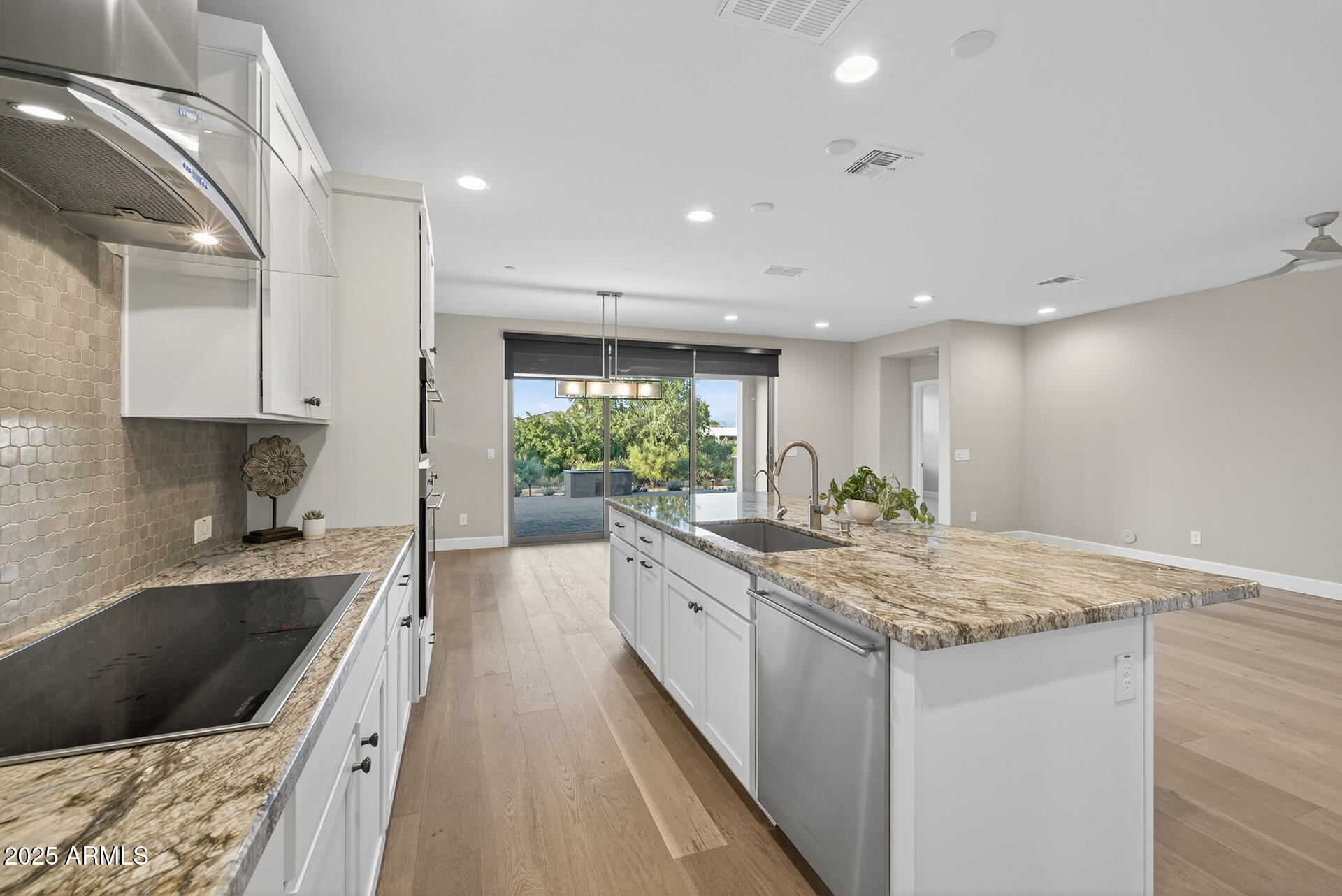 17662 East Chevelon Canyon Circle Rio Verde, AZ 85263 - Photo 10 of 31 a kitchen with a sink stove and cabinets