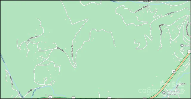 a view of a backyard of the house