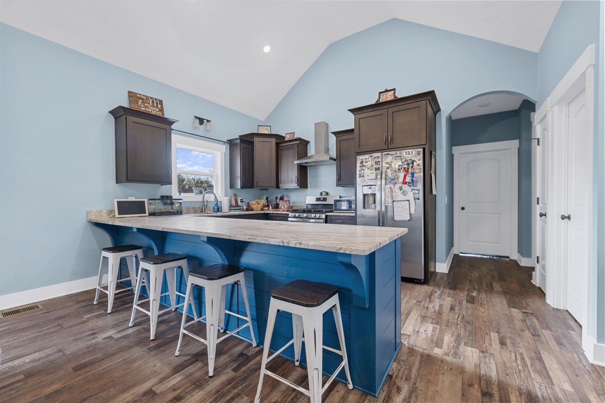 2086 Beverly Court Springfield, TN 37172 - Photo 11 of 39 a kitchen with granite countertop wooden floors and chairs