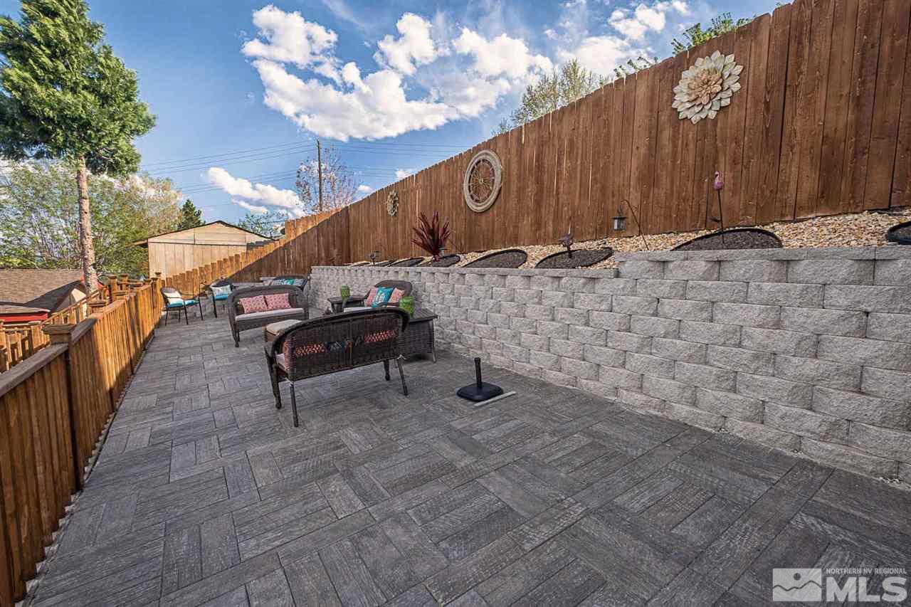 2745 Snapdragon Way Reno, NV 89512 - Photo 26 of 30 a view of a bench with wooden fence