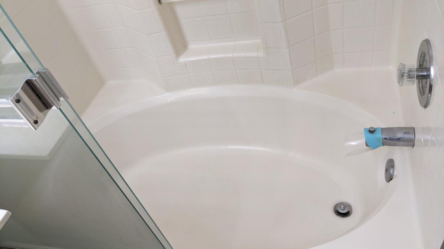 5691 Spry Common Fremont, CA 94538 - Photo 15 of 20 a bathroom with a tub