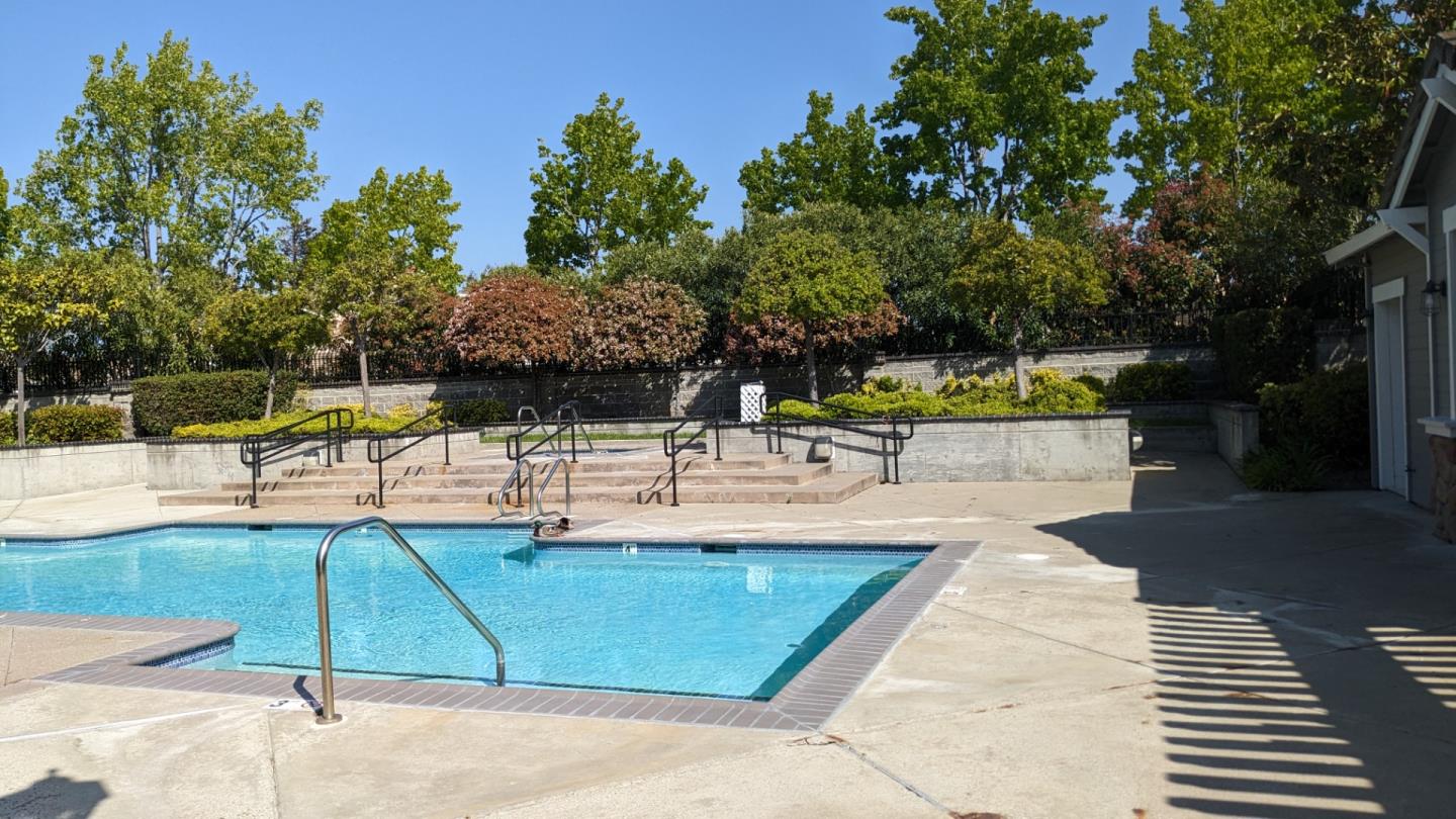 5691 Spry Common Fremont, CA 94538 - Photo 18 of 20 a view of a swimming pool with a patio