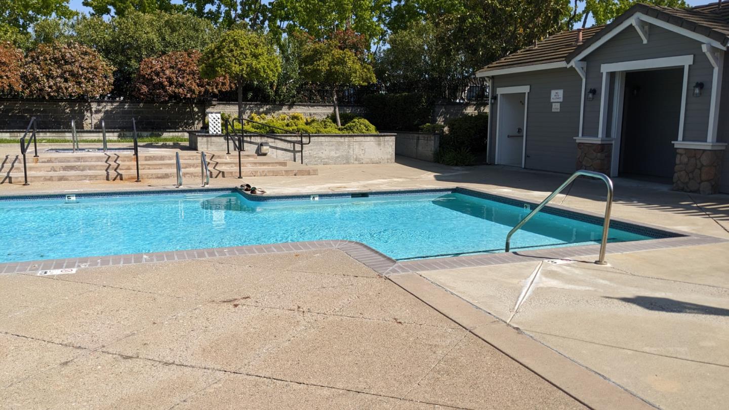 5691 Spry Common Fremont, CA 94538 - Photo 20 of 20 a house with swimming pool in front of it