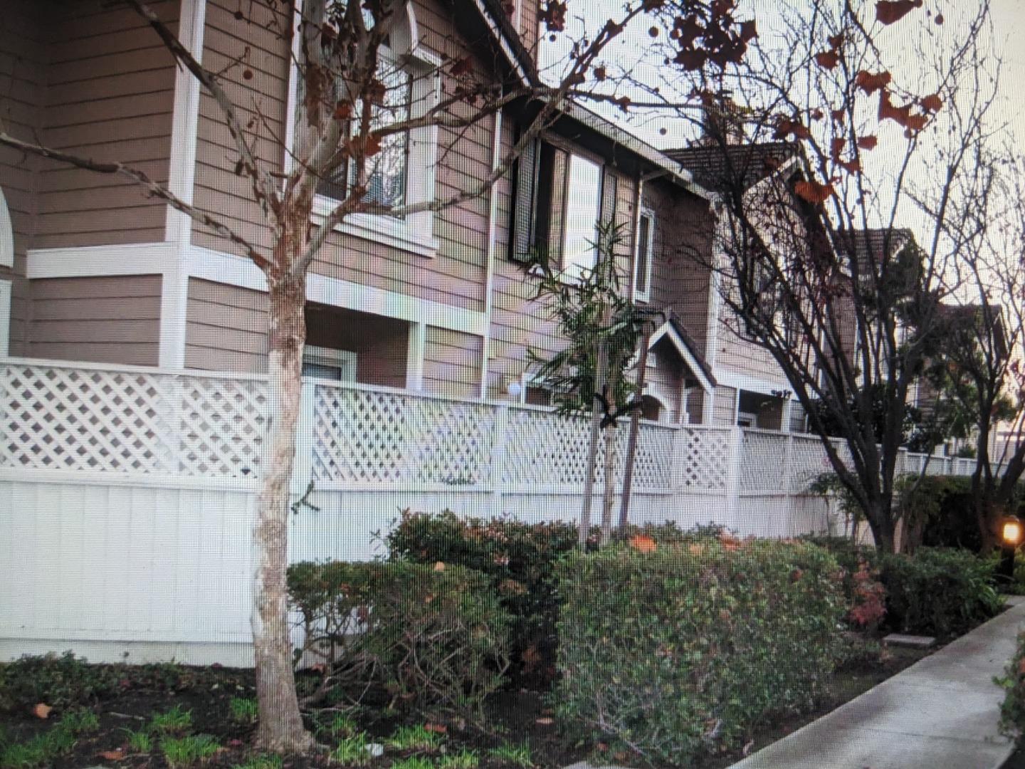 5691 Spry Common Fremont, CA 94538 - Photo 6 of 20 front view of a house with a small yard
