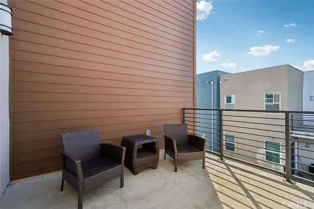 a view of a chairs in front of house