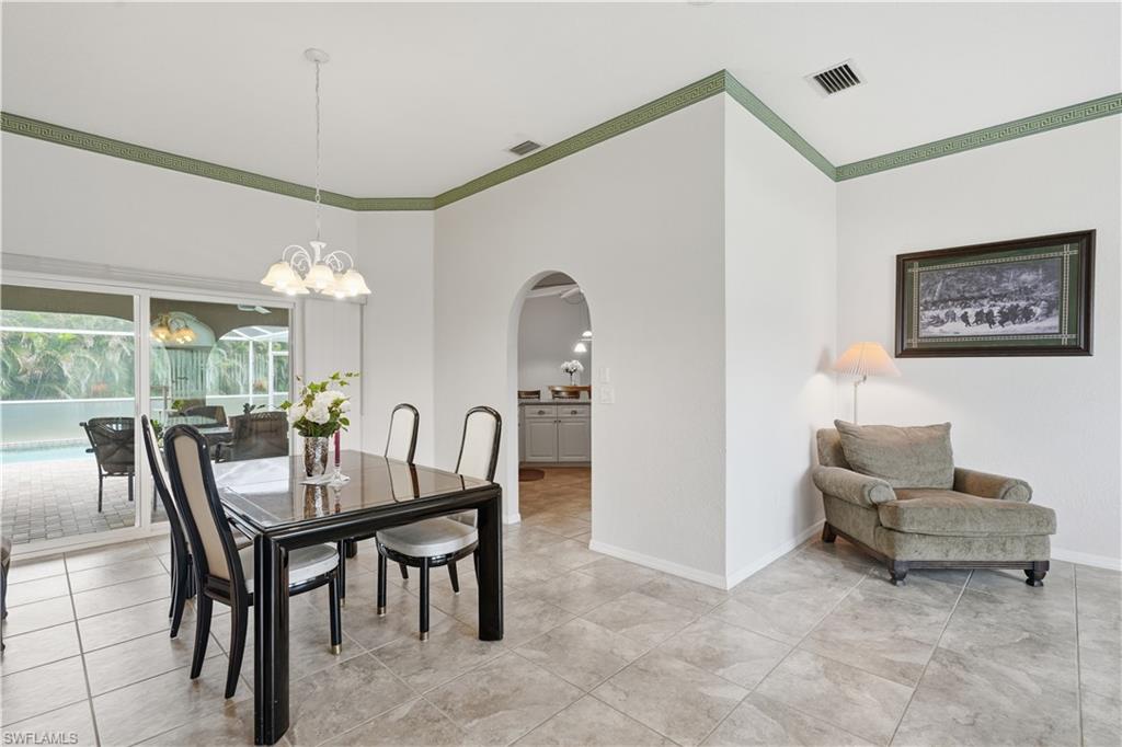 25378 Rupert Road Punta Gorda, FL 33983 - Photo 9 of 50 Spacious interior with tile flooring and a decorative green accent band