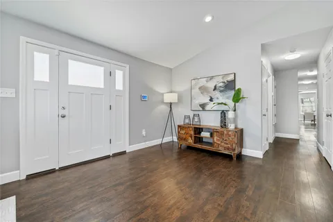 a bedroom with furniture and window