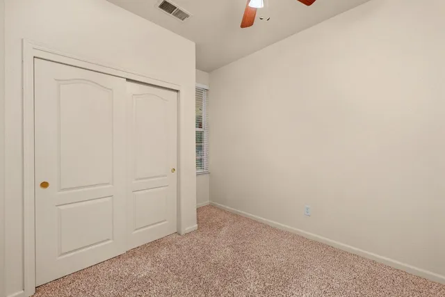 an empty room with closet
