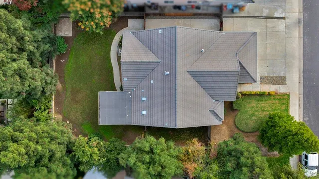 an aerial view of a house having yard