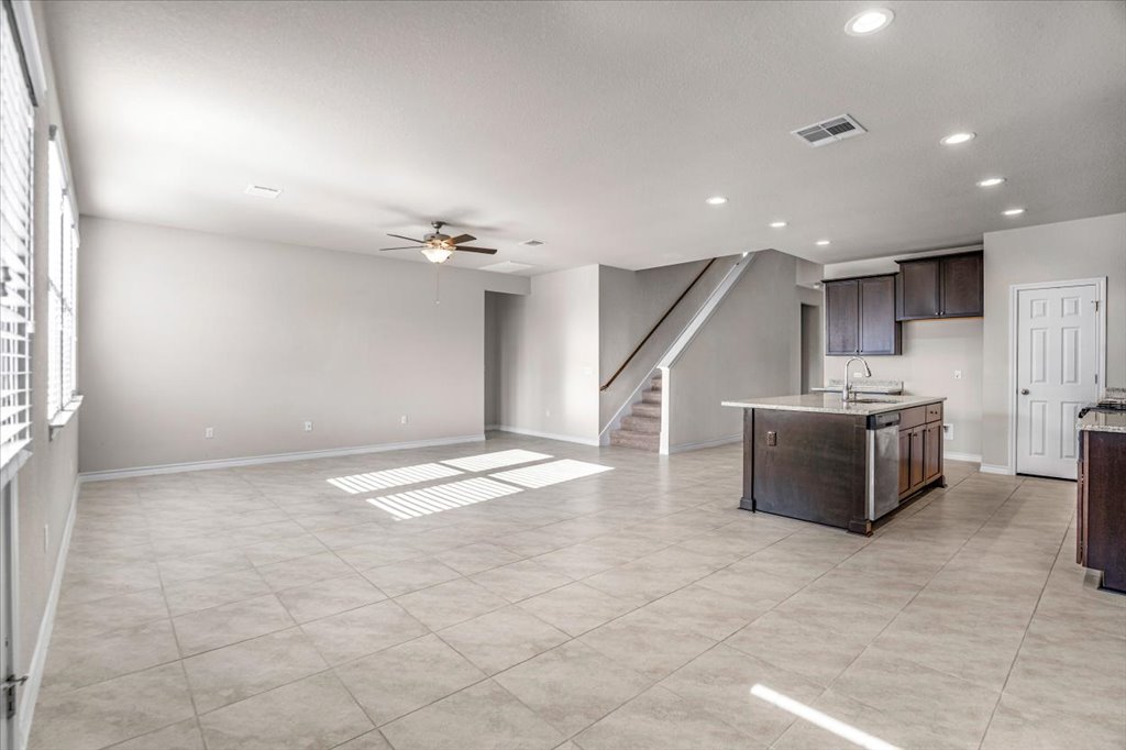 10909 Mickelson Drive Austin, TX 78747 - Photo 8 of 23 a view of kitchen with furniture and staircase