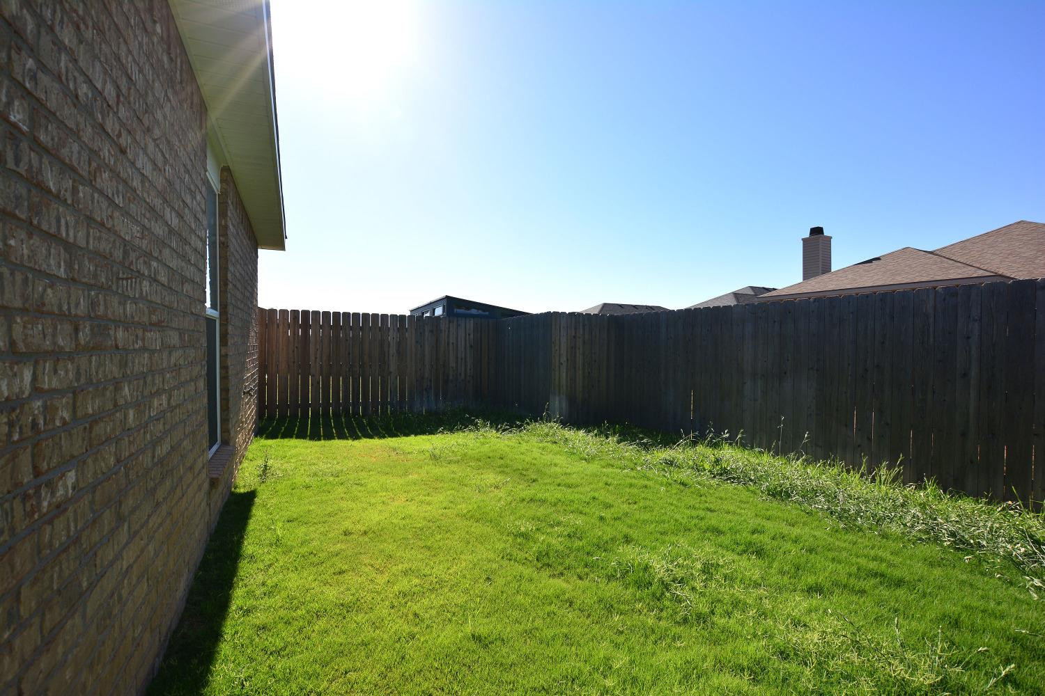 7513 28th Street Lubbock, TX 79407 - Photo 18 of 18 a backyard of a house