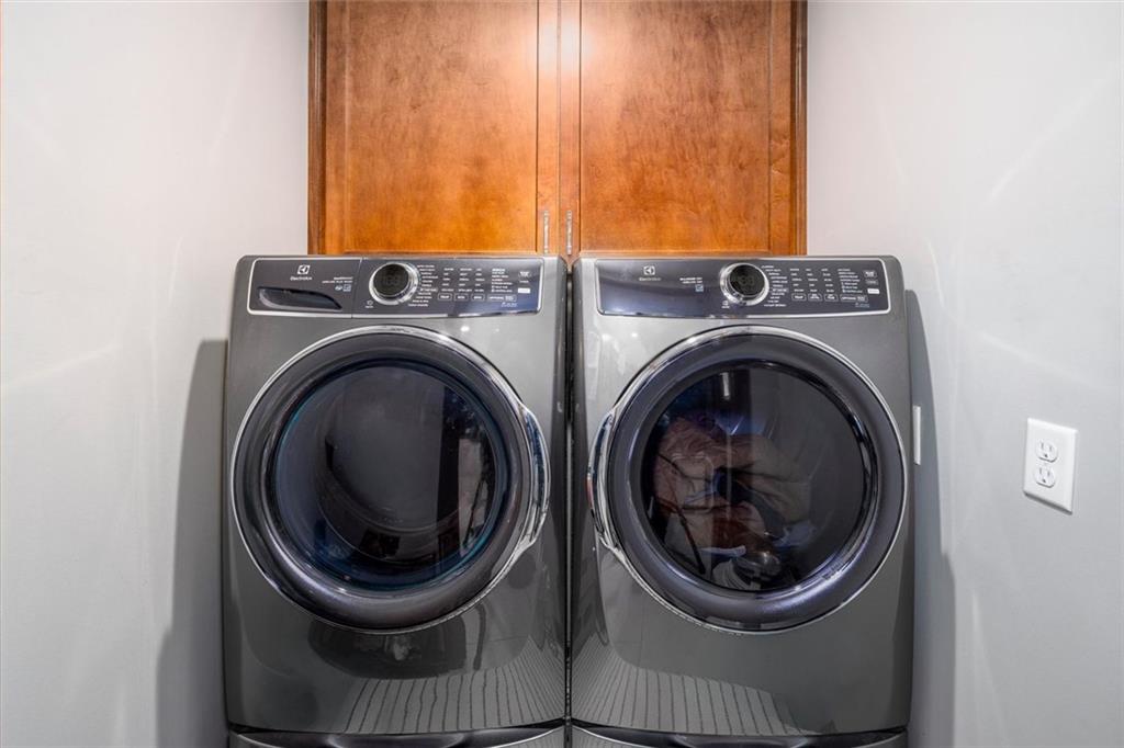2282 Marthasville Court Smoke Rise, GA 30087 - Photo 16 of 48 a utility room with dryer and washer