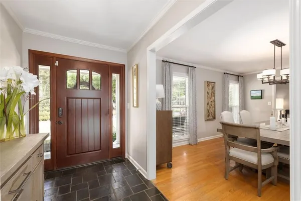 a view of a livingroom with furniture and windows