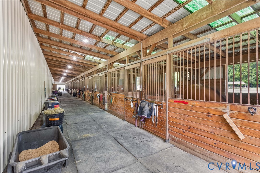 2016 Forge Road Toano, VA 23168 - Photo 20 of 99 Equestrian barn featuring multiple stalls with woo