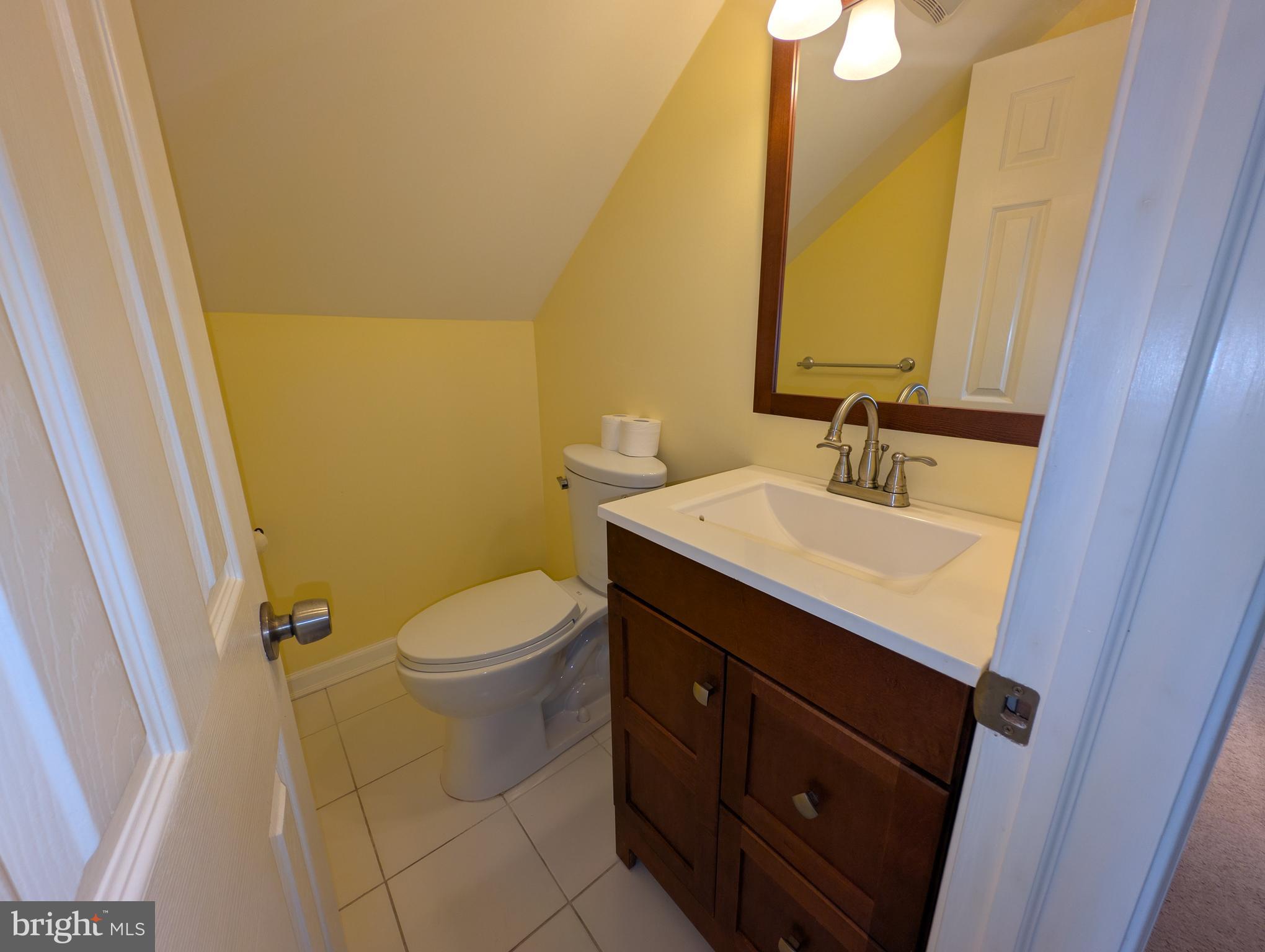 1129 Providence Road Springfield, PA 19064 - Photo 15 of 15 a bathroom with a sink and a mirror