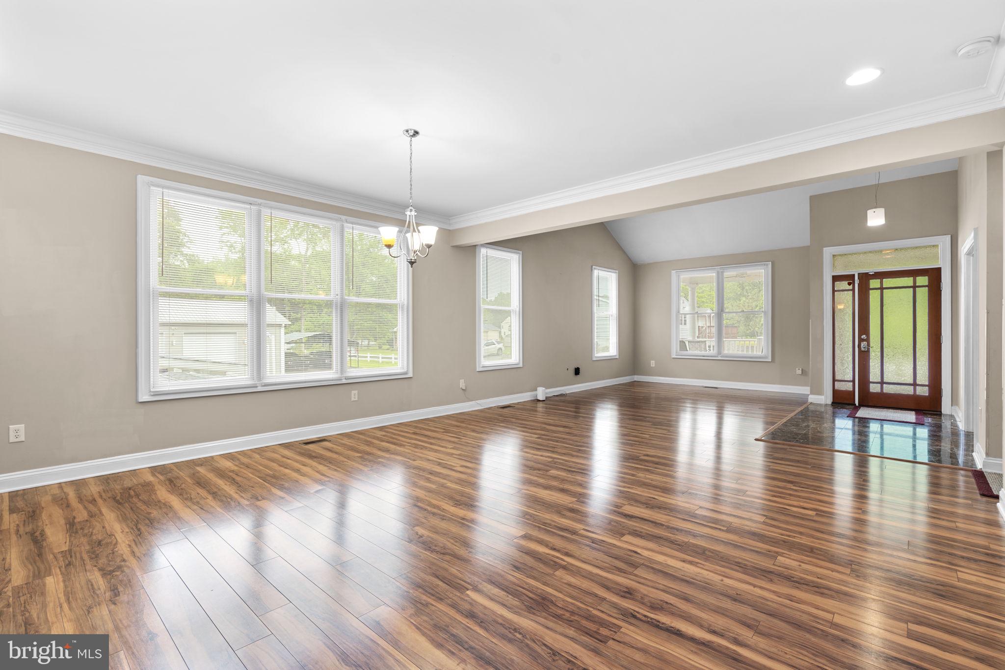 8024 Solley Road Glen Burnie, MD 21060 - Photo 19 of 83 an empty room with wooden floor and windows