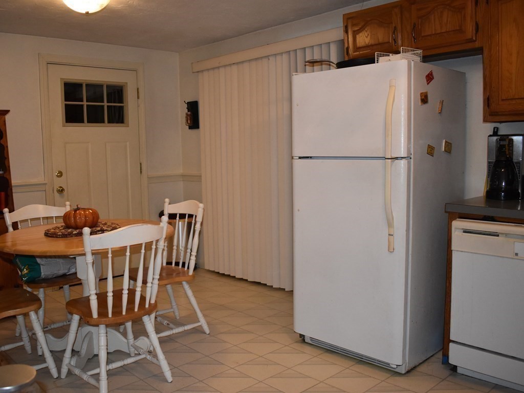 1702 State Road Plymouth, MA 02360 - Photo 7 of 17 a view of a dining room with furniture