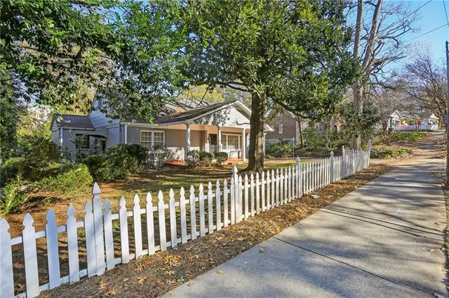 a front view of a house with a porch