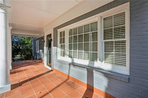 a view of a room with windows