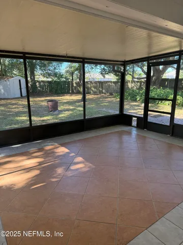 a view of a large window with an outdoor space