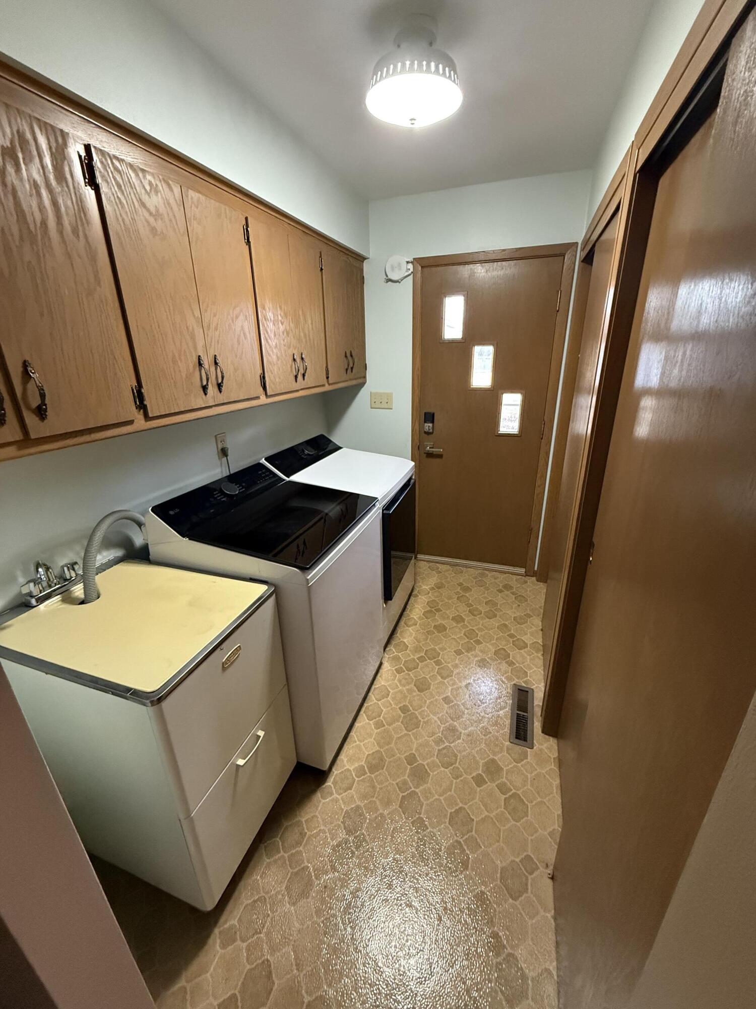 565 Amy Belle Road Richfield, WI 53017 - Photo 9 of 22 Laundry Room