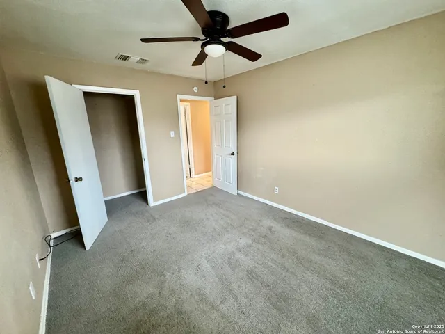 an empty room with a bench