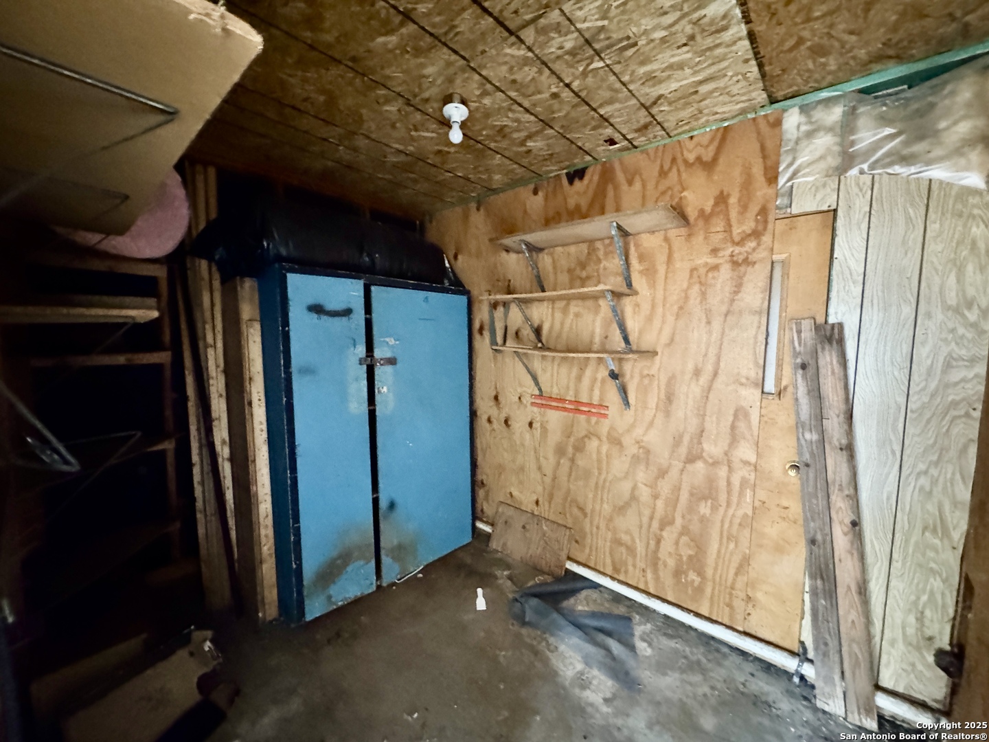 146 Stapleton Street San Antonio, TX 78227 - Photo 24 of 28 a view of a room with wooden walls