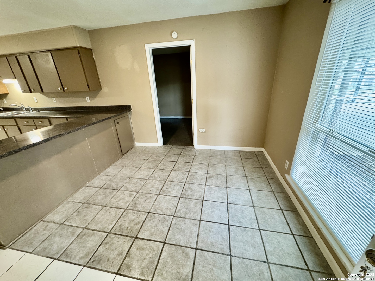 146 Stapleton Street San Antonio, TX 78227 - Photo 3 of 28 a view of a livingroom with an empty space and a sink