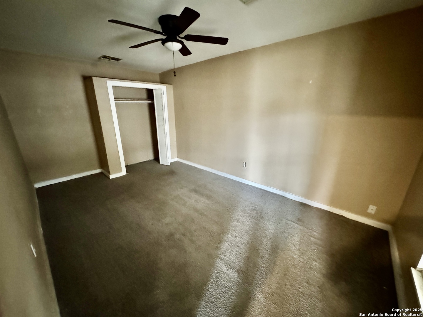 146 Stapleton Street San Antonio, TX 78227 - Photo 6 of 28 a view of empty room with wooden floor