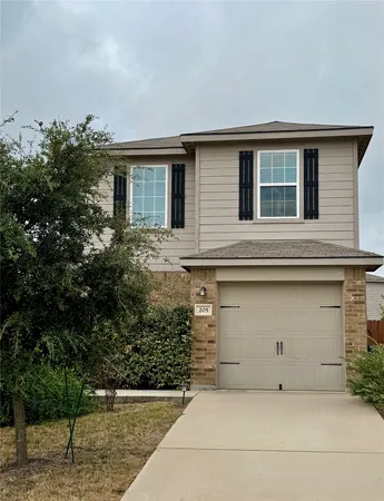 a front view of house with yard