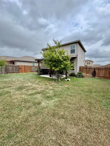 a house view with a garden space
