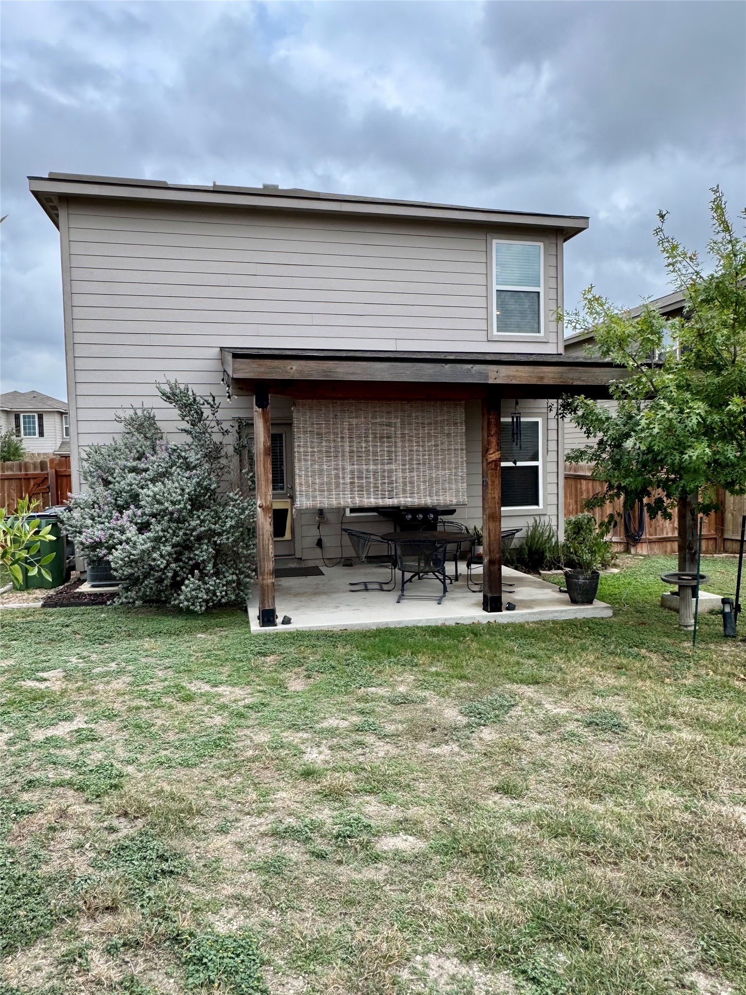 205 Denson Lane, Unit 8D Jarrell, TX 76537 - Photo 27 of 29 a house view with a garden space