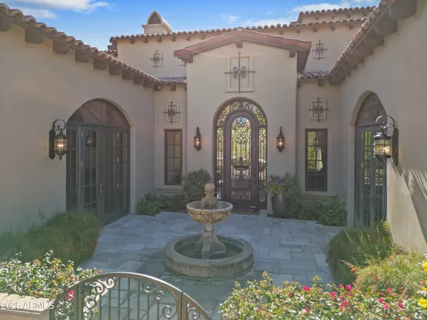a room with gym equipment and a table